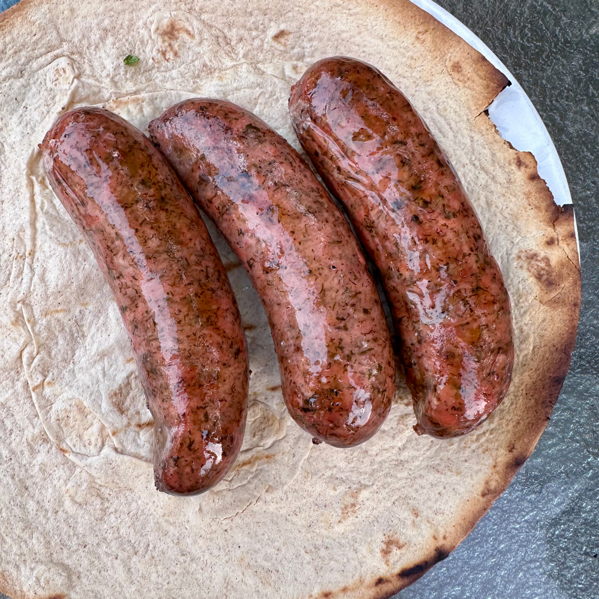 Fully cooked grilled chicken sausages – hickory-smoked and vacuum-packed, ready to heat and serve