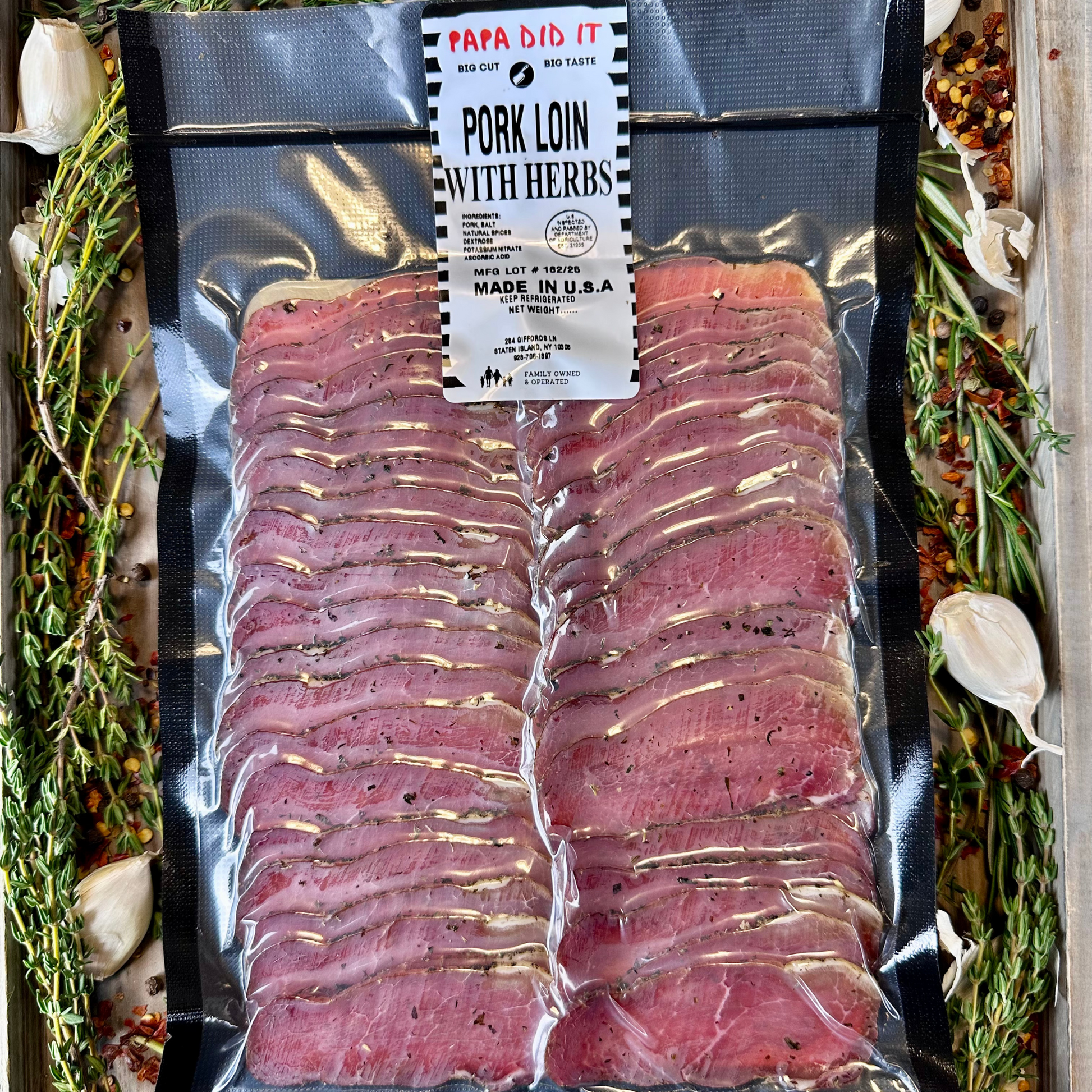 Vacuum-sealed package of pork loin with herbs, sliced, by Papa Did It
