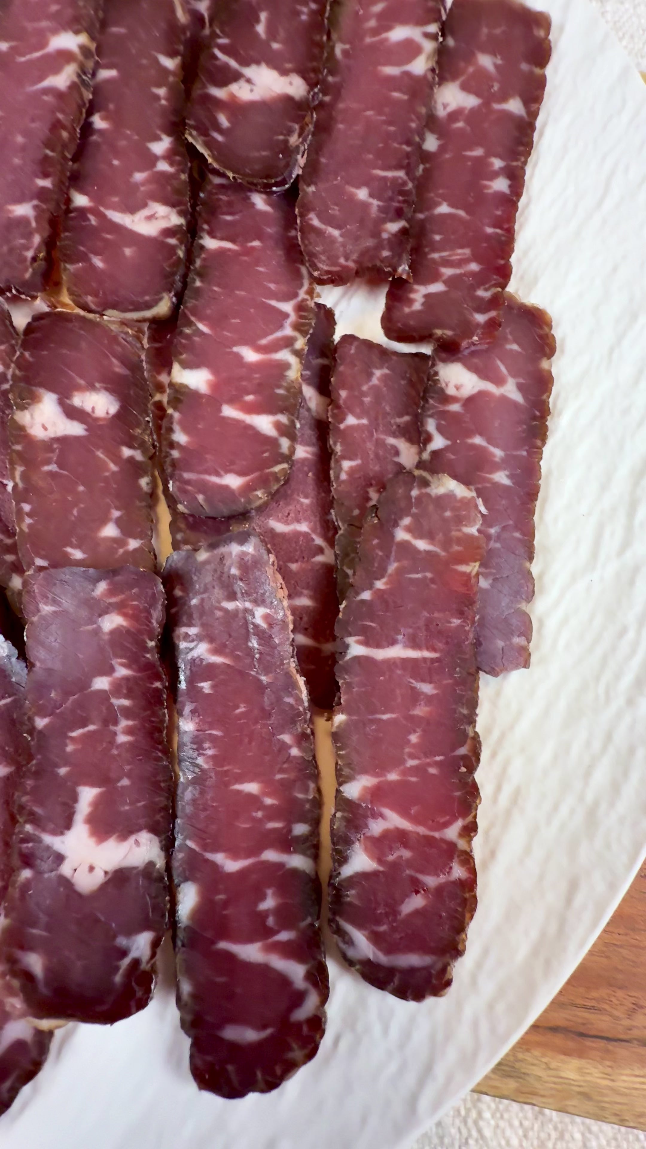 Hand-sliced dry-cured beef prosciutto by Papa Did It
