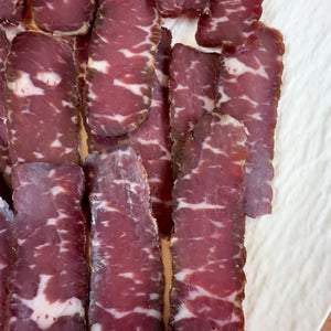 Hand-sliced dry-cured beef prosciutto by Papa Did It
