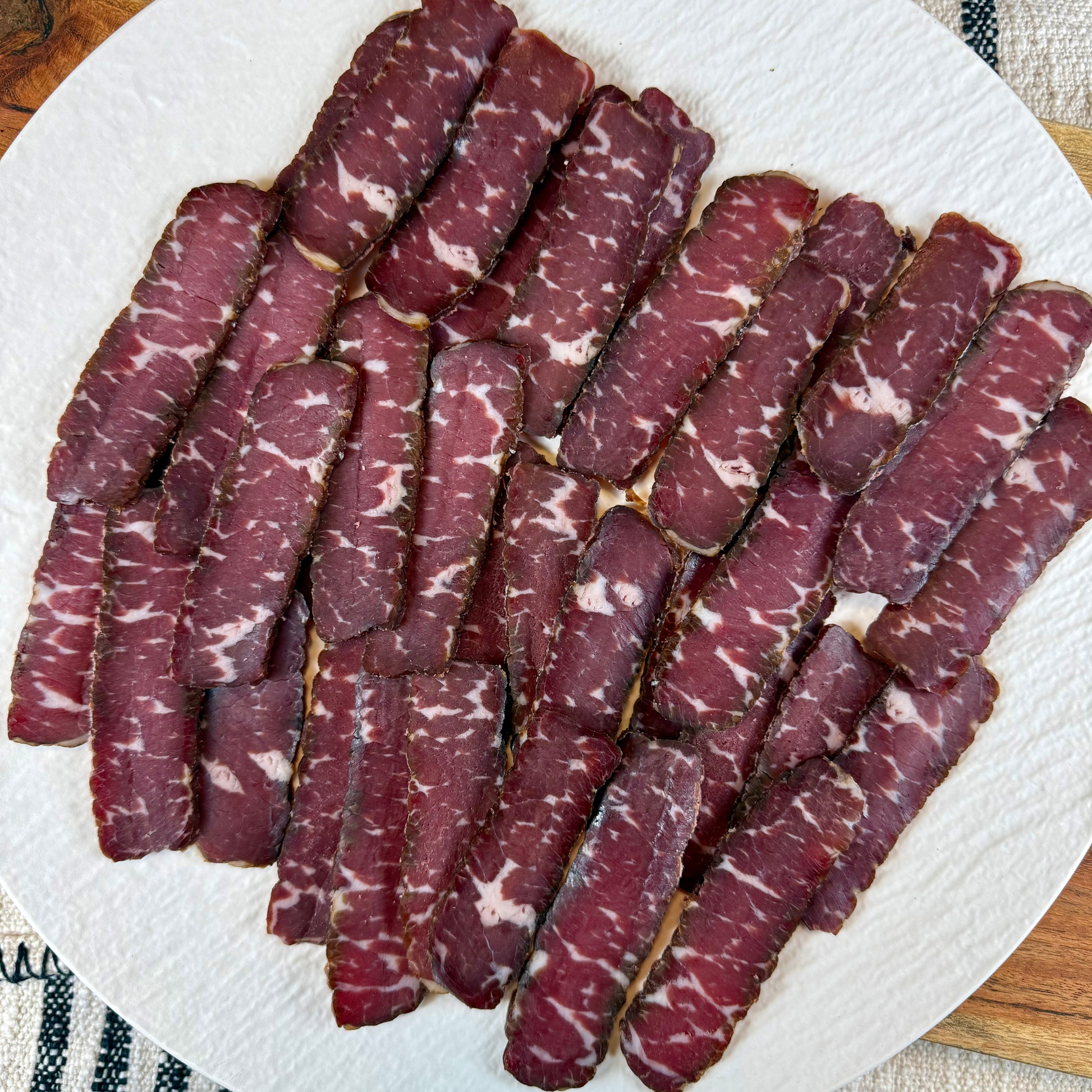 Suho Meso dry cured beef charcuterie platter sliced and ready to serve