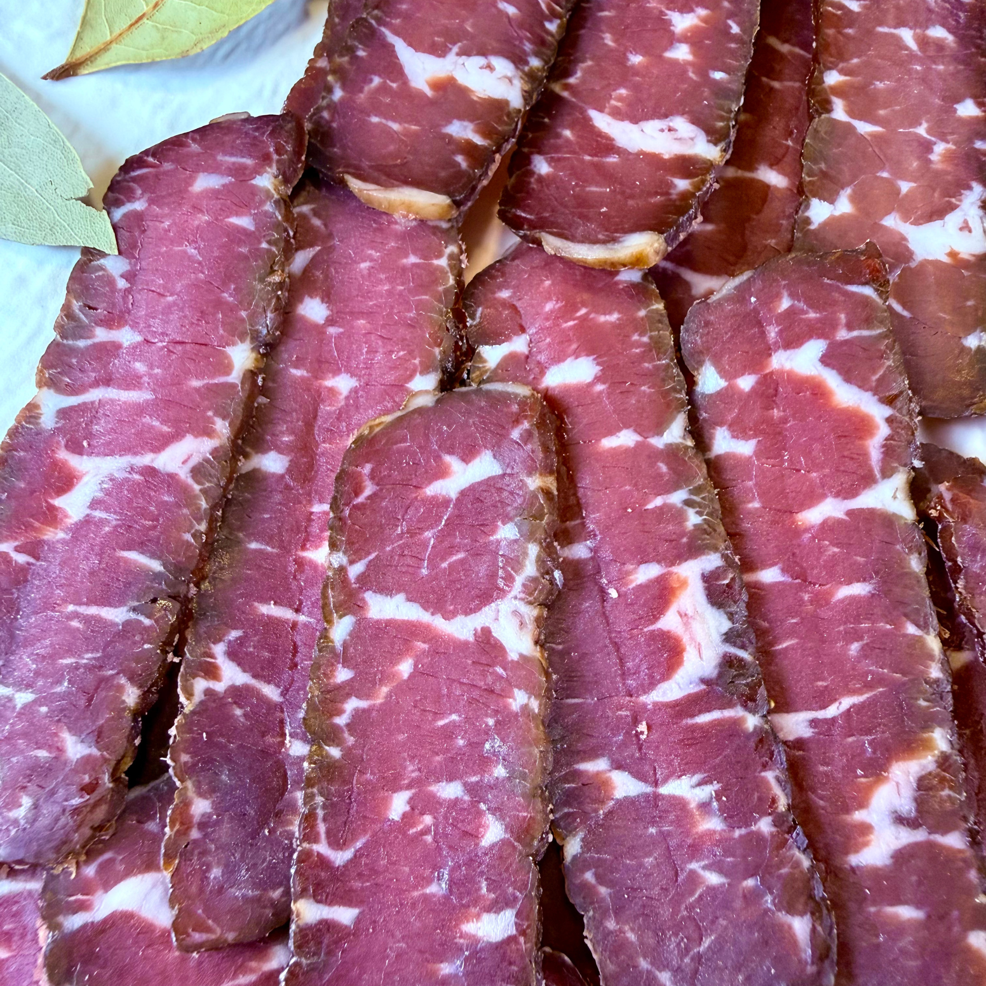 Detailed texture of Suho Meso Balkan style dry cured beef slices